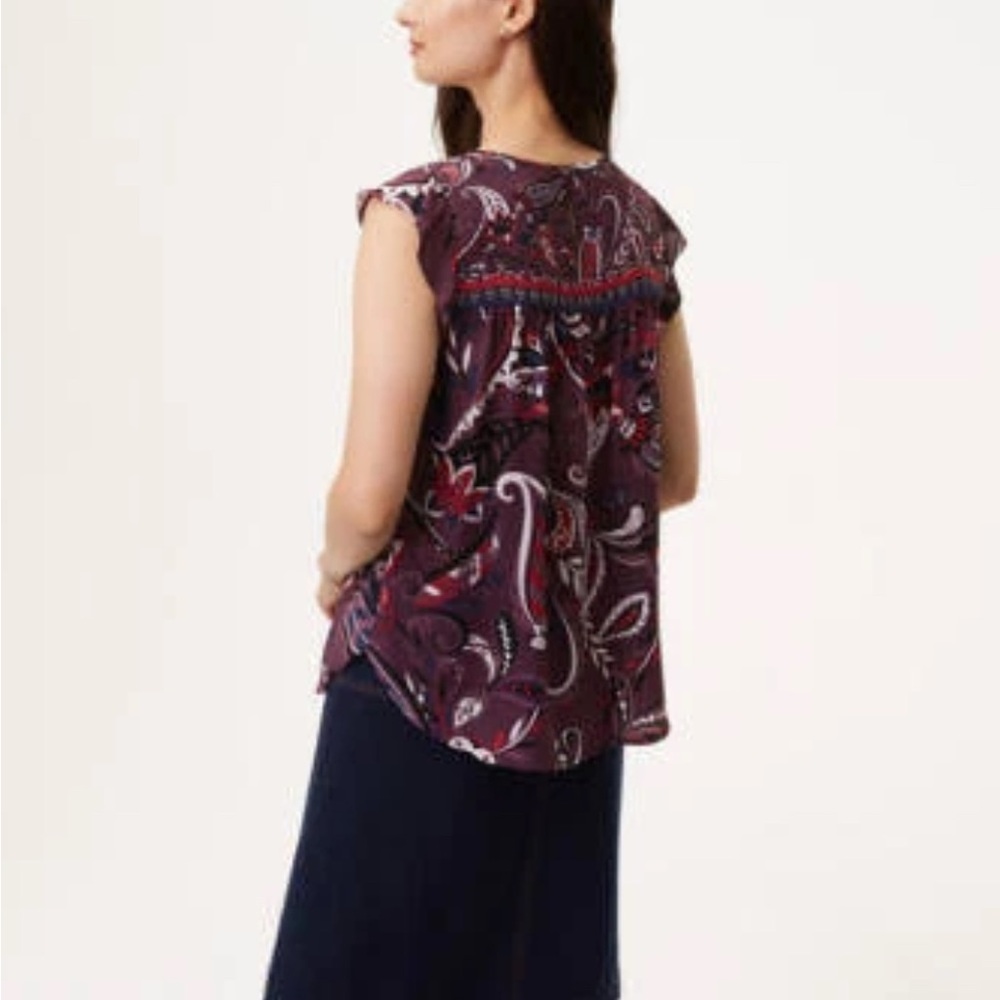 LOFT Purple Paisley Flutter Sleeve Blouse Smocked Ruffle Front and Keyhole Back. - Picture 3 of 11